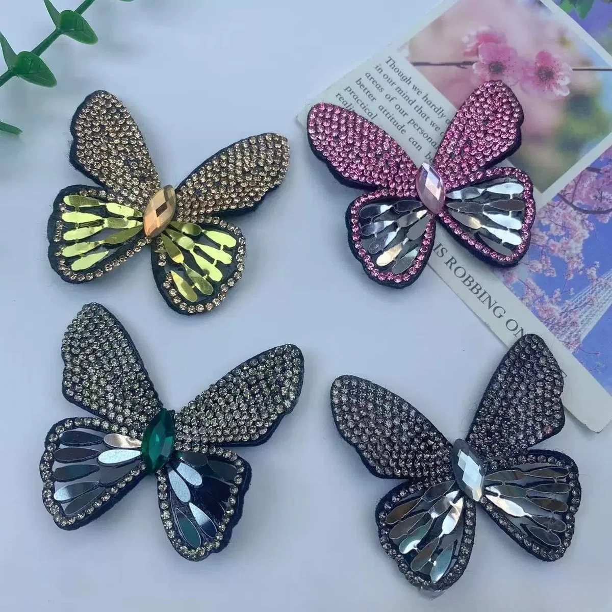 Rhinestone butterfly applique and flower accessory reference