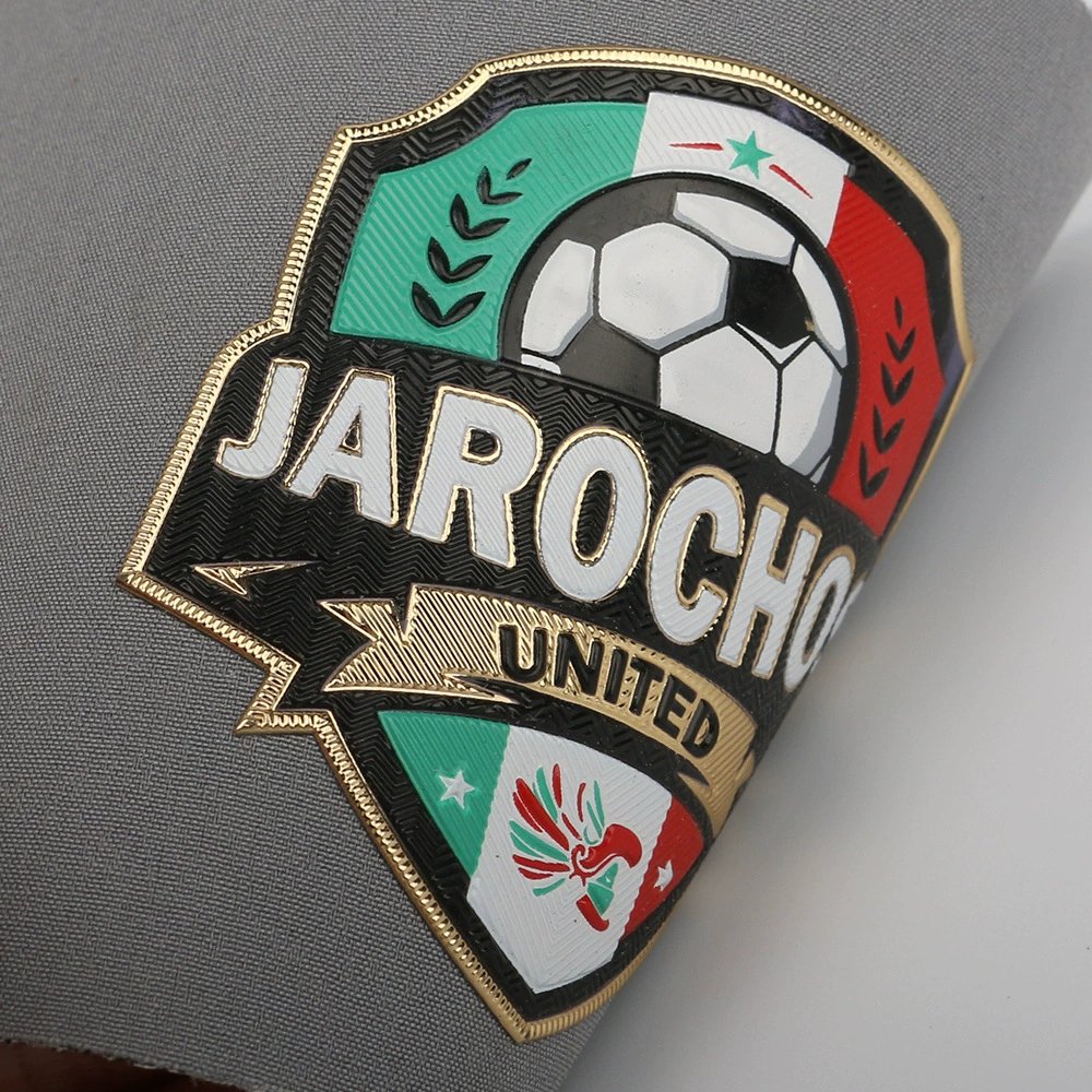 Custom 3D TPU Soft Rubber Logo Patches – Gold & Silver Eco-Friendly Embossed Labels for Clothing