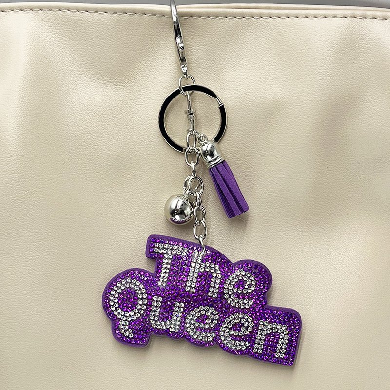 The Queen” Rhinestone Keychain with Tassel — Sparkling Fashion Bag Charm for Women