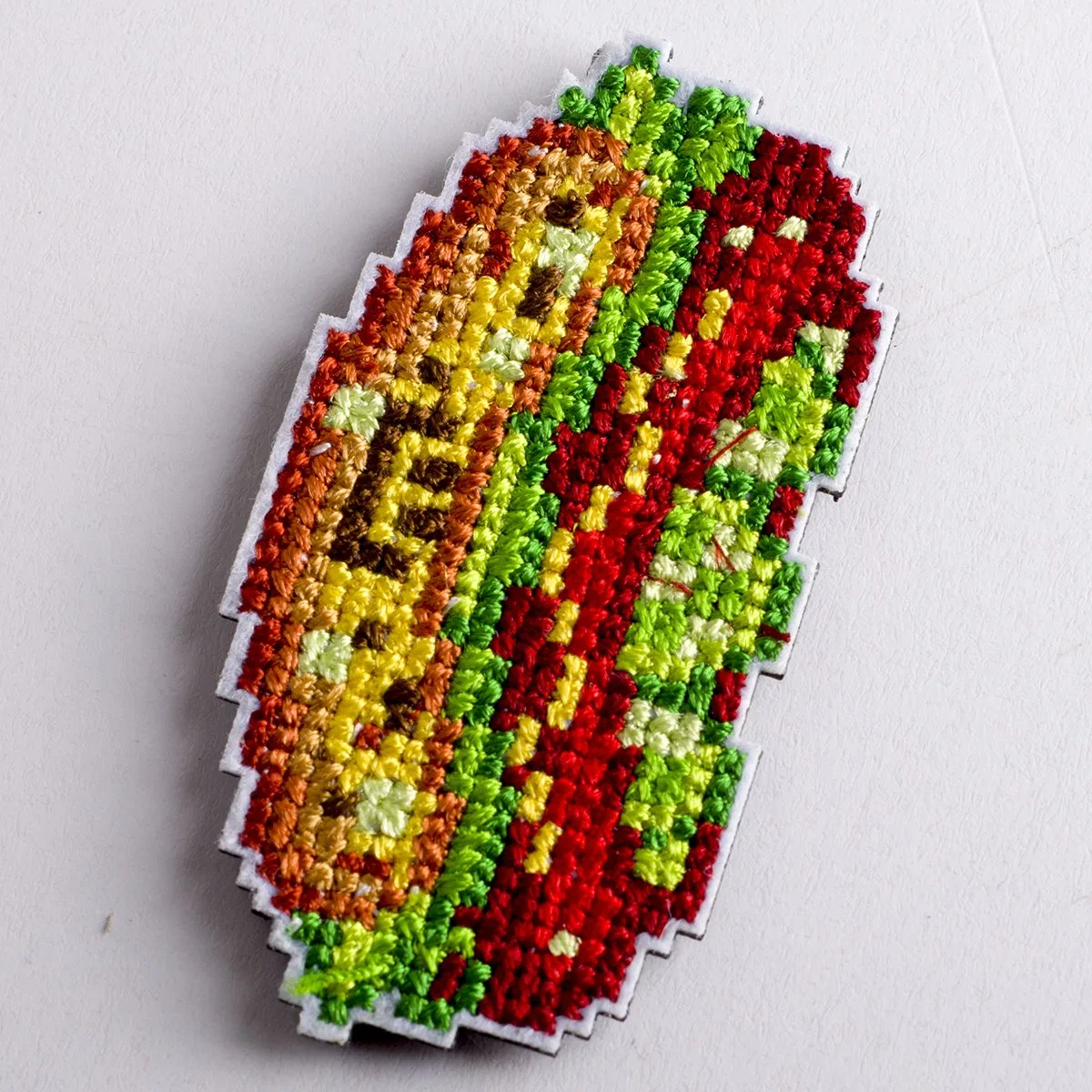 Embroidered T-shirt badge face