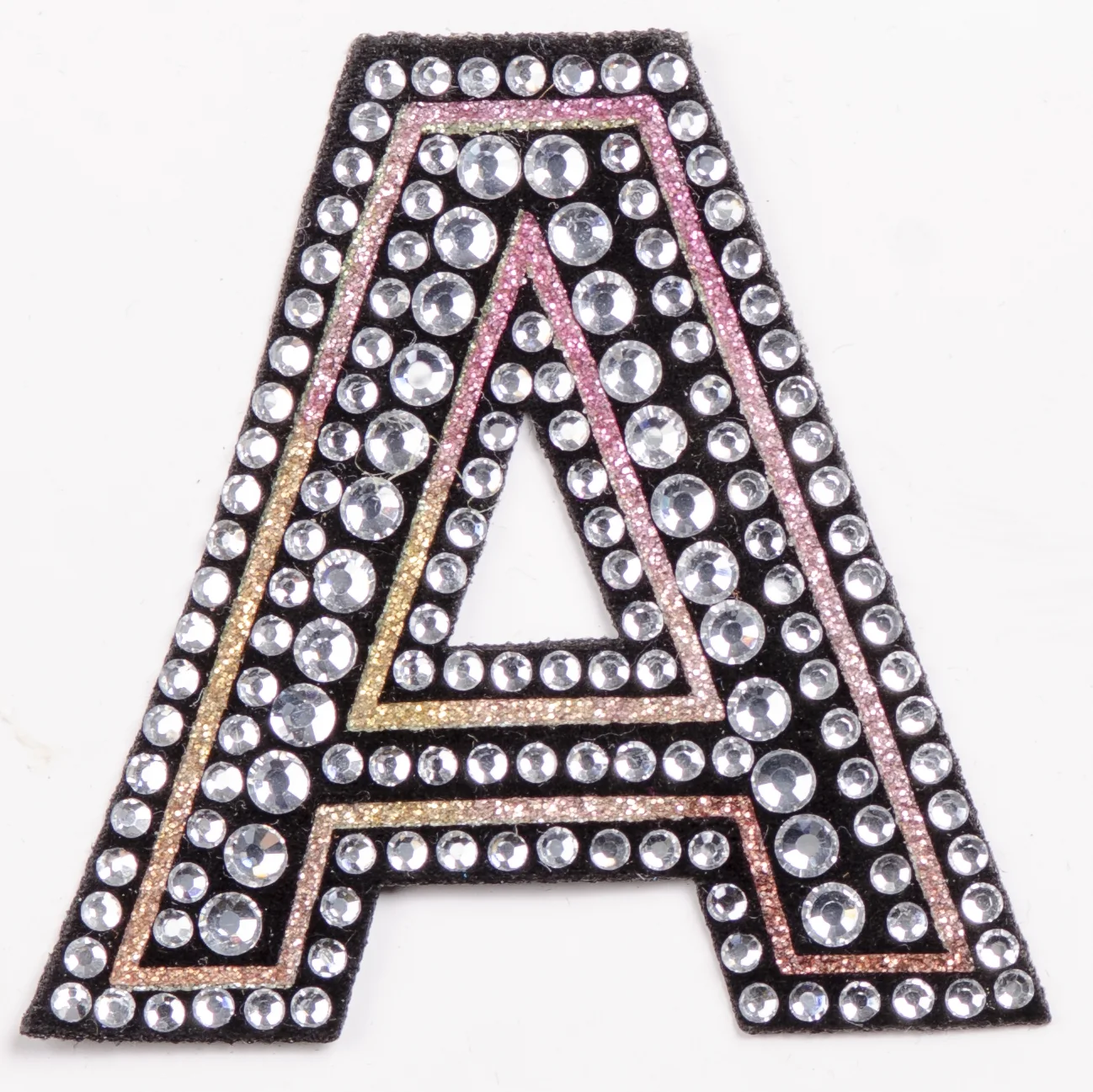 Black textile varsity letter patch detail for sample inspection