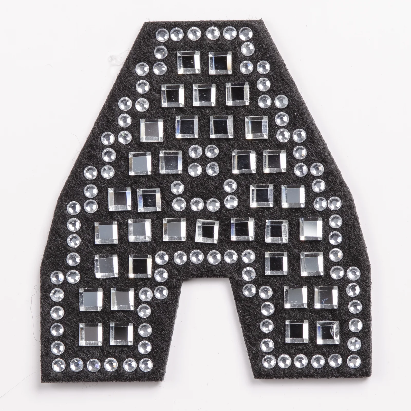 Square-cut and round crystal grid letter patch detail