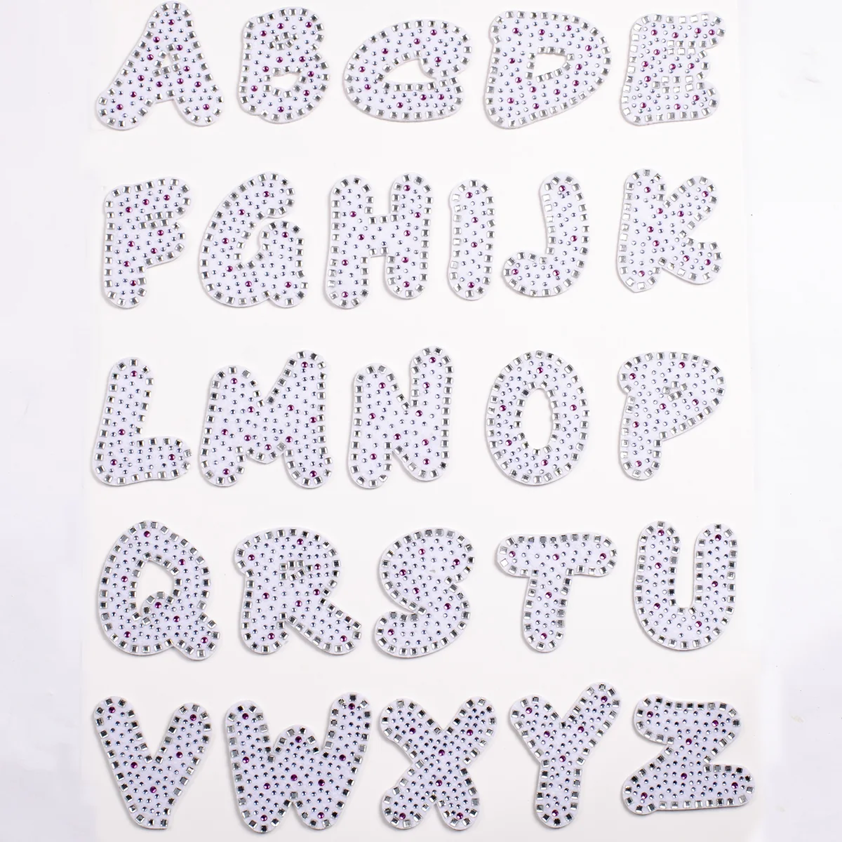 White alphabet appliques with square crystal borders and round accent stones