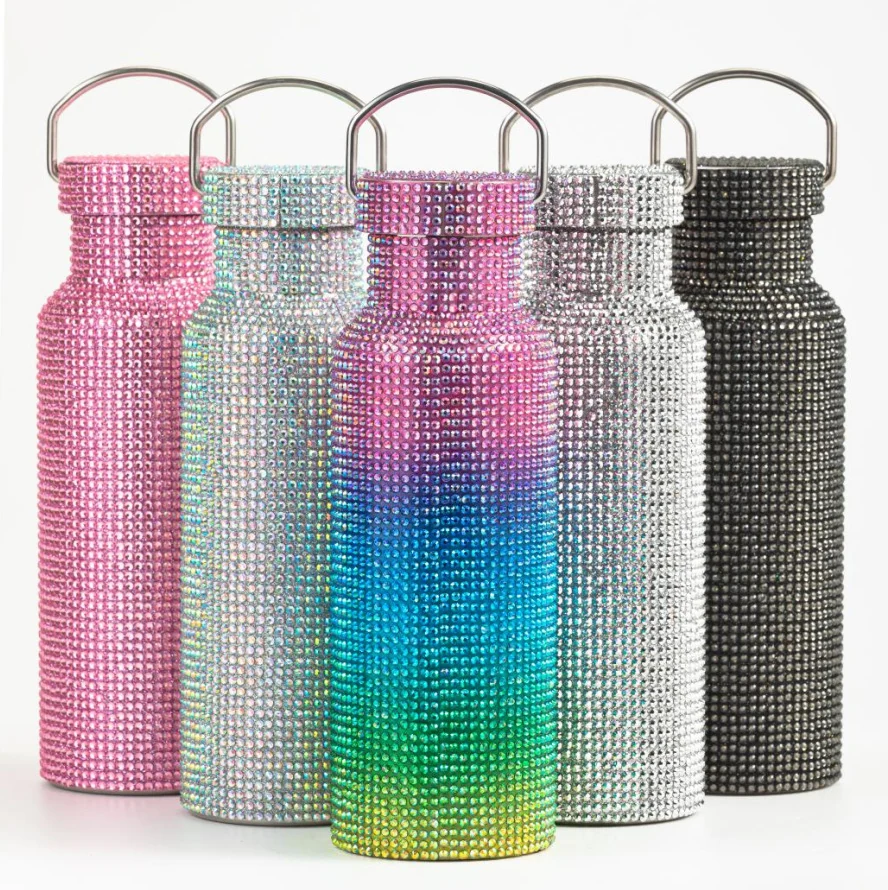 Pink rhinestone cylindrical water bottle with metal-tone ring carry handle