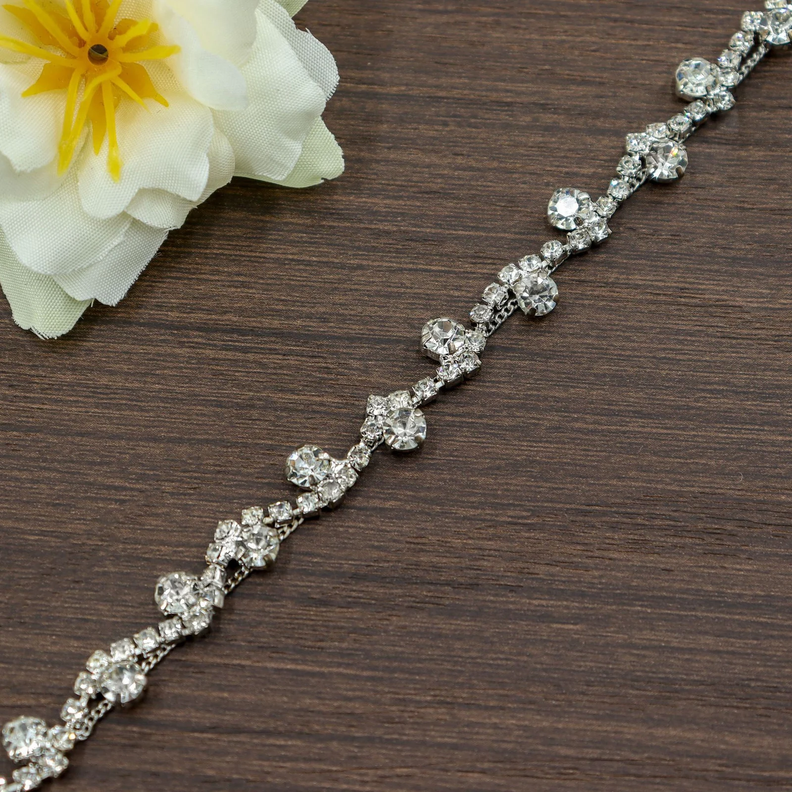 Sunflower floral S-shaped and dangle clear rhinestone chain trim designs