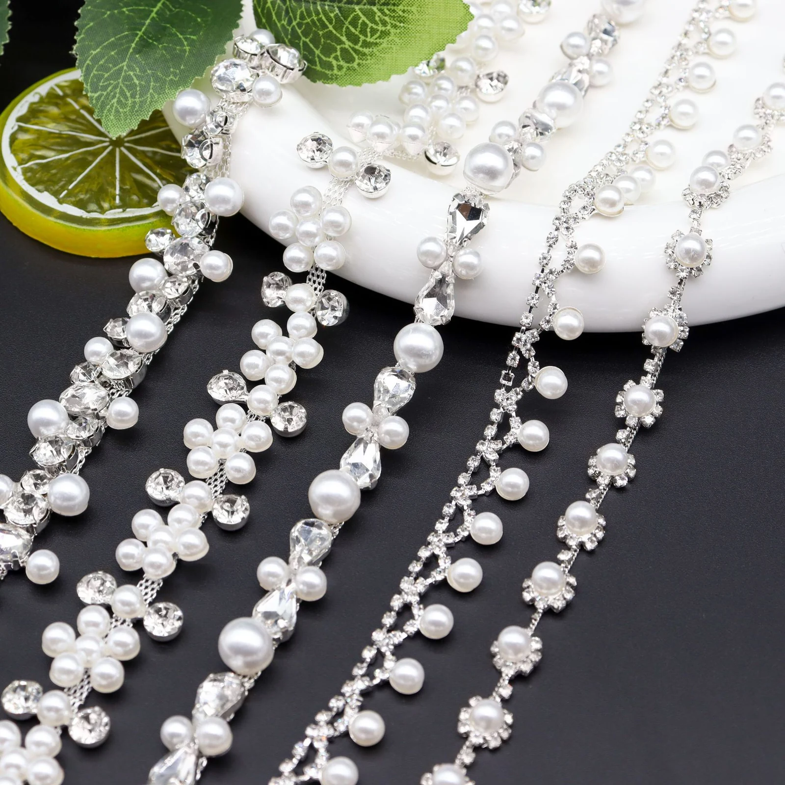 Five pearl and glass rhinestone chain motifs including sunflower teardrop flower and dangle patterns