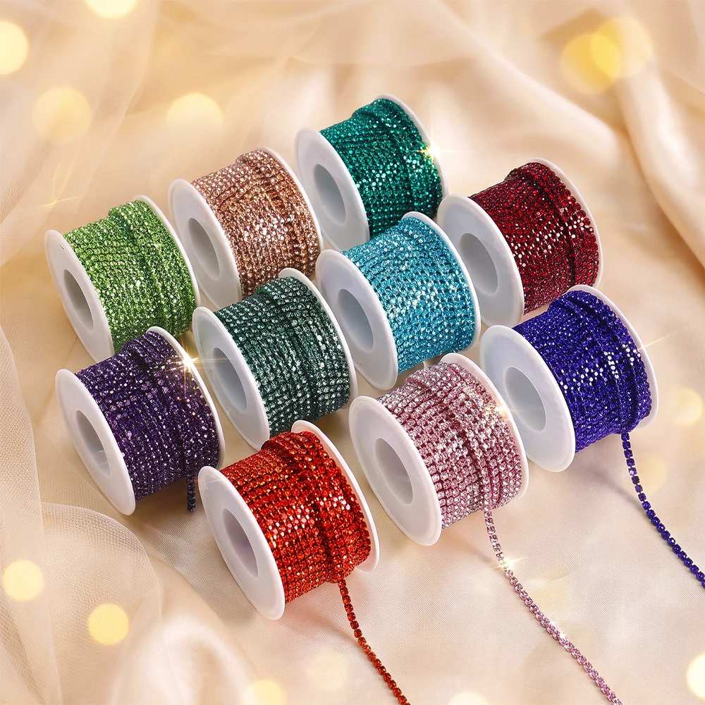 Spools of electroplated rhinestone claw chain in thirty-two colors