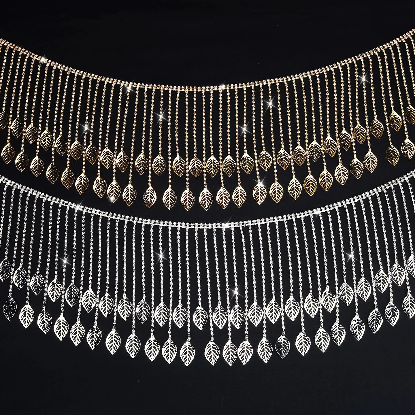Graduated rhinestone fringe with open leaf drops in four finishes