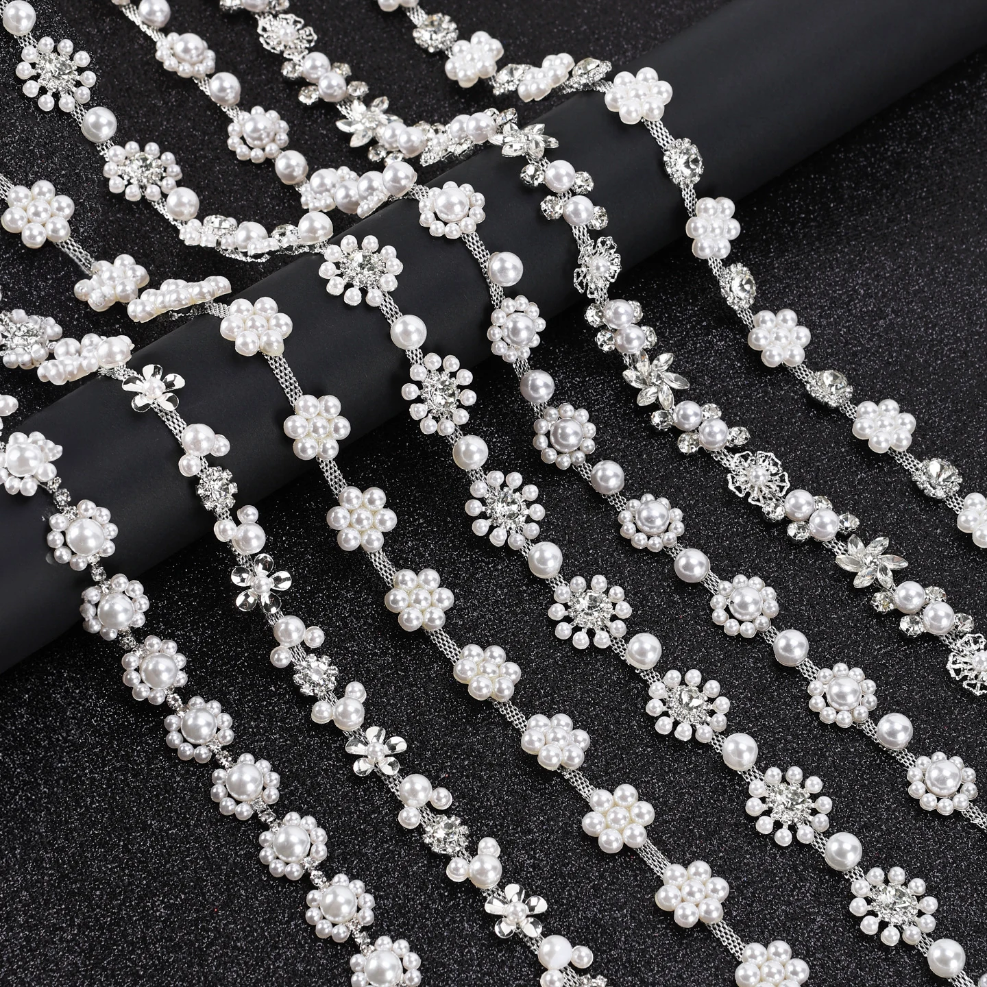 Seven silver-tone pearl and rhinestone flower chain constructions