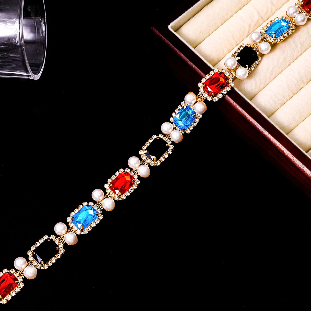 Rectangle red blue and black crystals linked with pearls and clear rhinestones